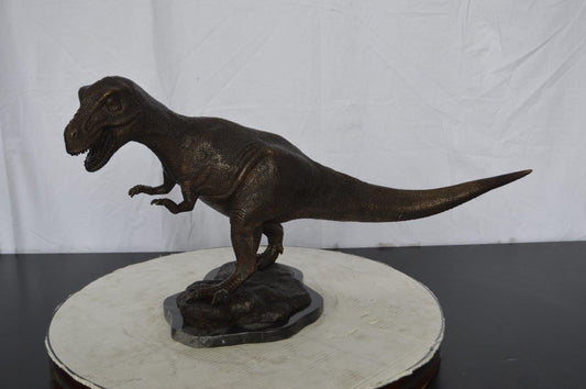 Tyrannosaurus Rex Dinosaur Bronze Statue -  Size: 31"L x 12"W x 15"H.