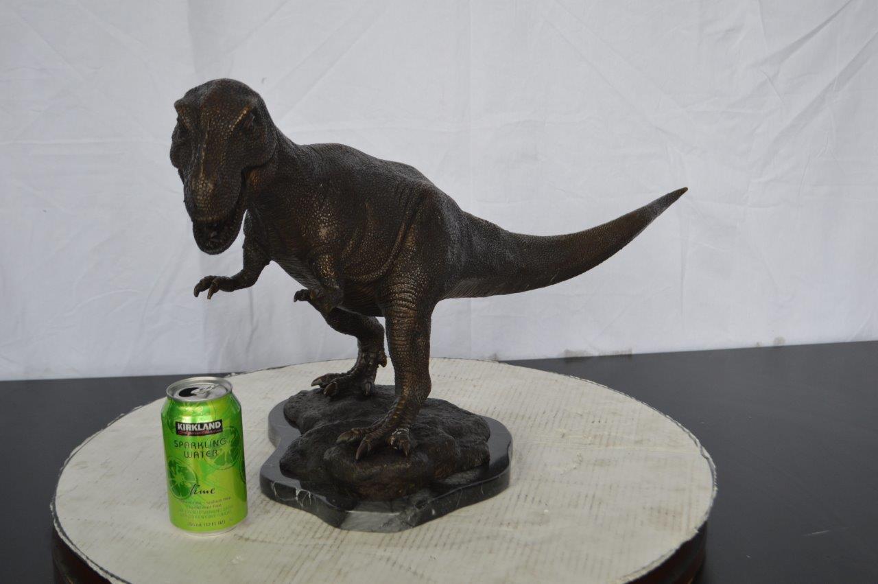 Tyrannosaurus Rex Dinosaur Bronze Statue -  Size: 31"L x 12"W x 15"H.