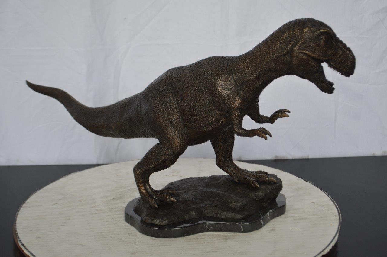Tyrannosaurus Rex Dinosaur Bronze Statue -  Size: 31"L x 12"W x 15"H.