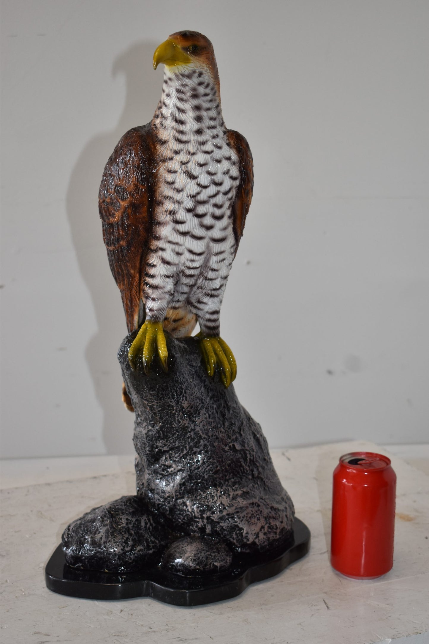 Eagle Standing on a Rock Looking for Prey Size: 10" x 13" x 22"H