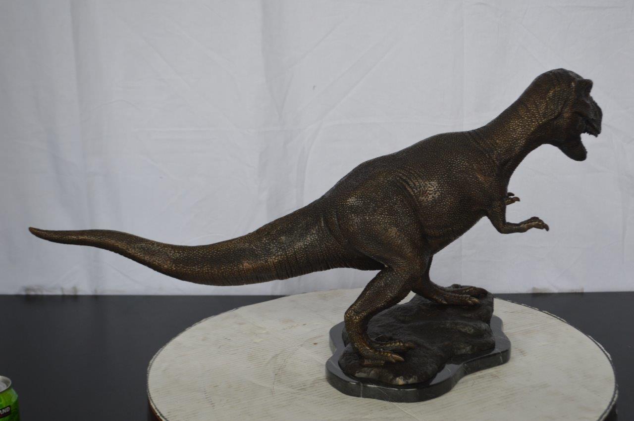 Tyrannosaurus Rex Dinosaur Bronze Statue -  Size: 31"L x 12"W x 15"H.