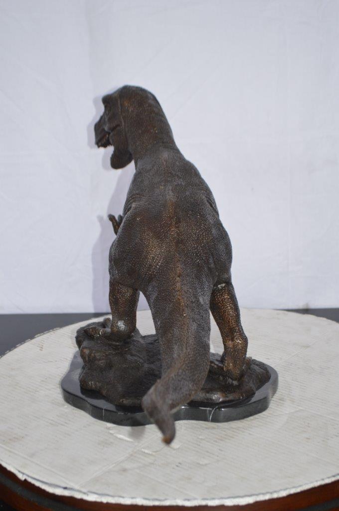 Tyrannosaurus Rex Dinosaur Bronze Statue -  Size: 31"L x 12"W x 15"H.