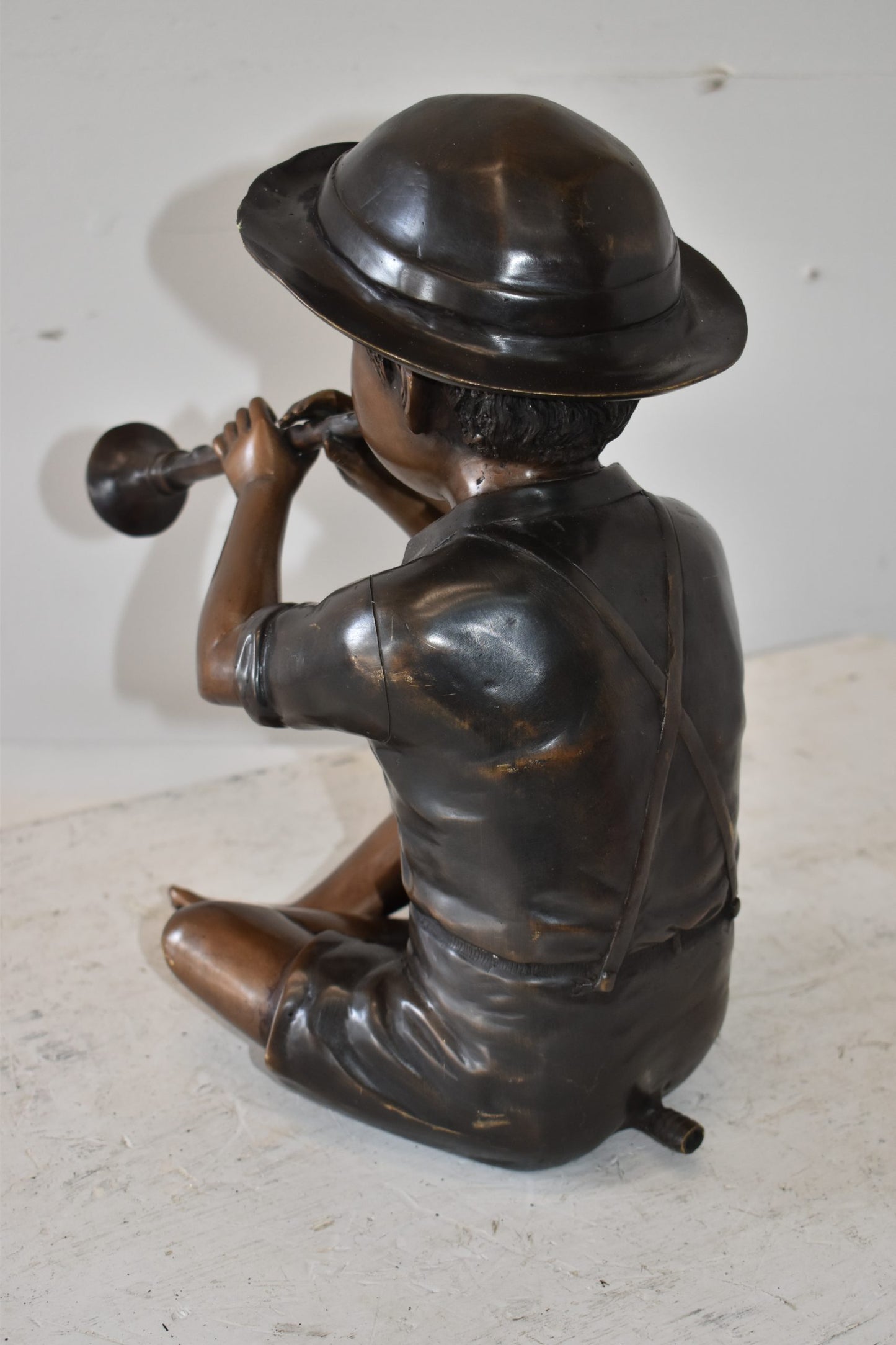 A little Boy Playing his Flute Bronze Fountain Size: 13" x 8" x 15"H