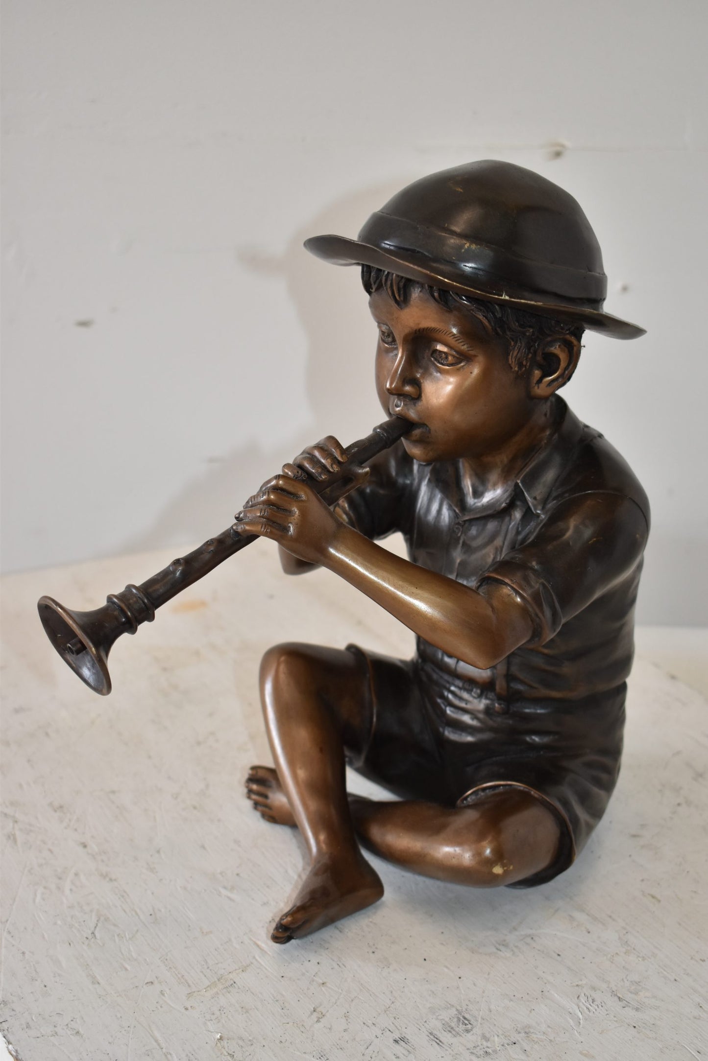 A little Boy Playing his Flute Bronze Fountain Size: 13" x 8" x 15"H