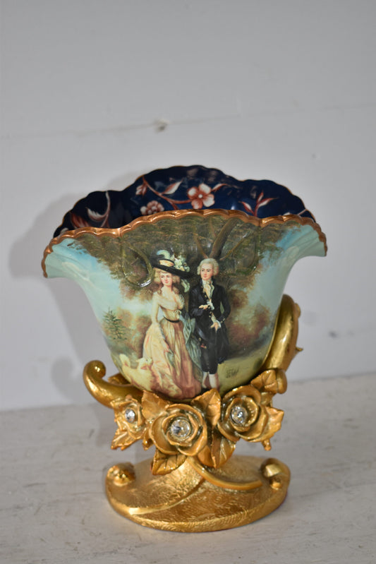 Blossoming Resin Vase with Mr. William Hallett Design Size: 9" x 8" x 12"H