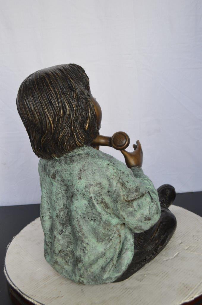 Young Child With an Old Telephone Bronze Statue - Size: 21"L x 14"W x 19"H.