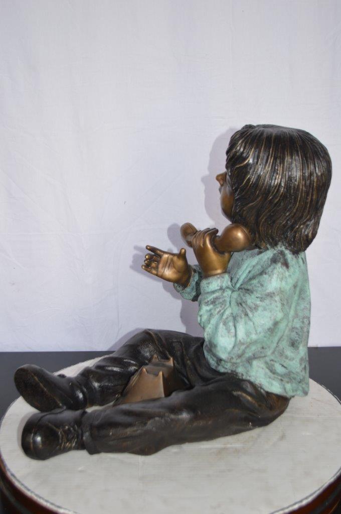 Young Child With an Old Telephone Bronze Statue - Size: 21"L x 14"W x 19"H.