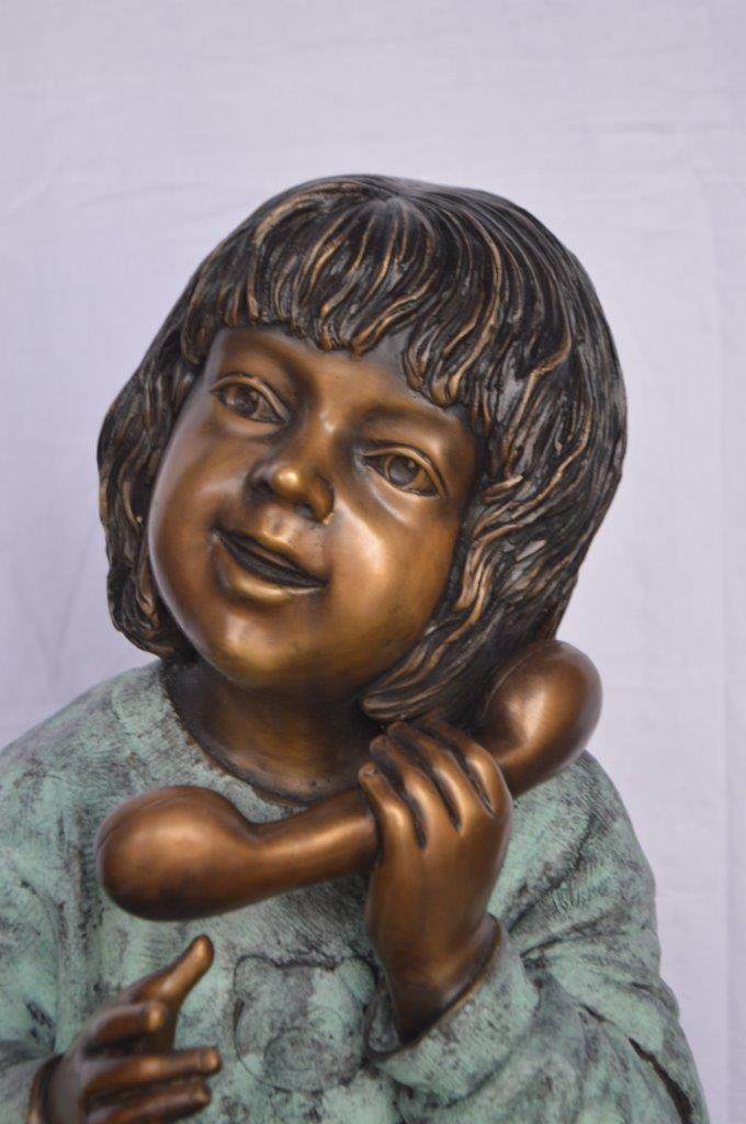 Young Child With an Old Telephone Bronze Statue - Size: 21"L x 14"W x 19"H.