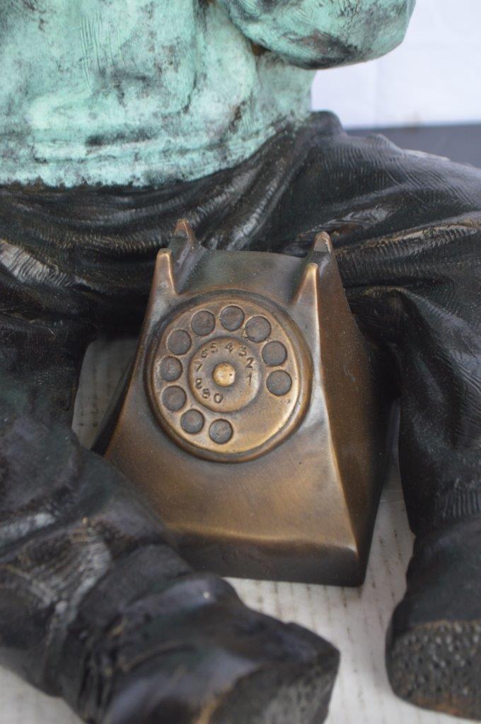 Young Child With an Old Telephone Bronze Statue - Size: 21"L x 14"W x 19"H.