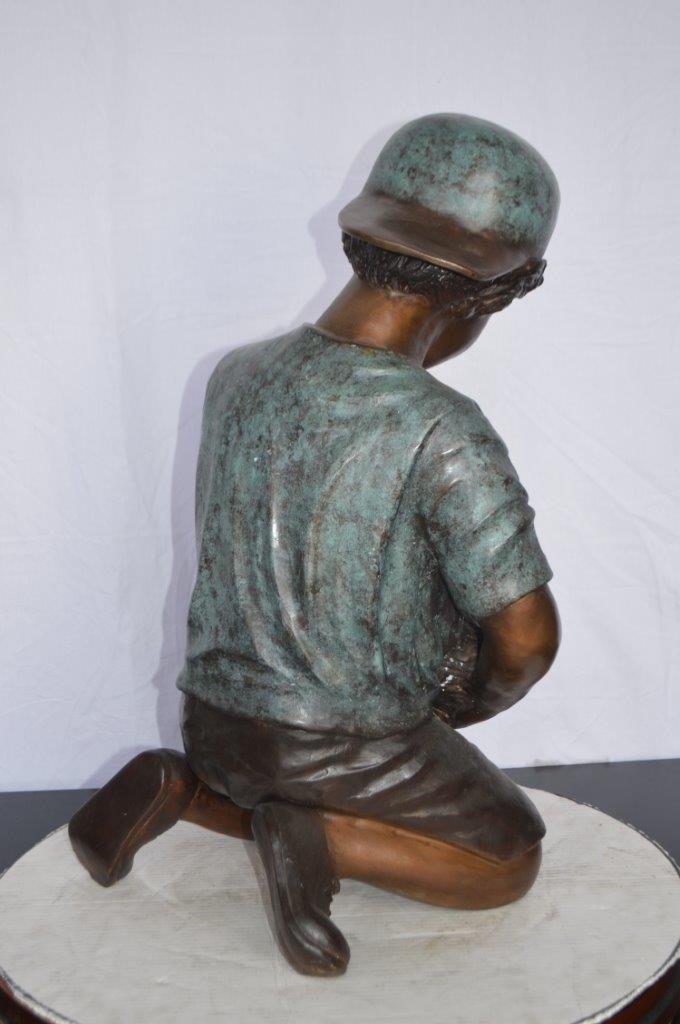 Young Child Playing With His Dog Bronze Statue - Size: 18"L x 17"W x 26"H.