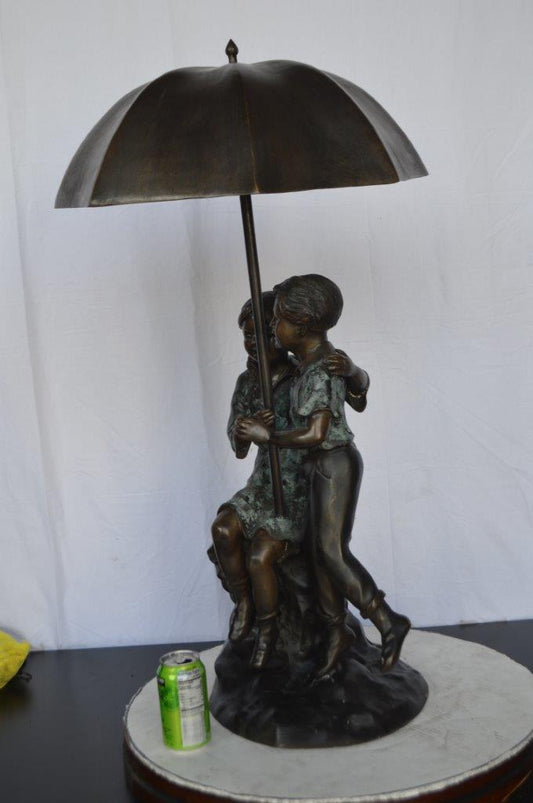 Kids Playing under Umbrella Bronze Fountain -  Size: 20"L x 20"W x 37"H.