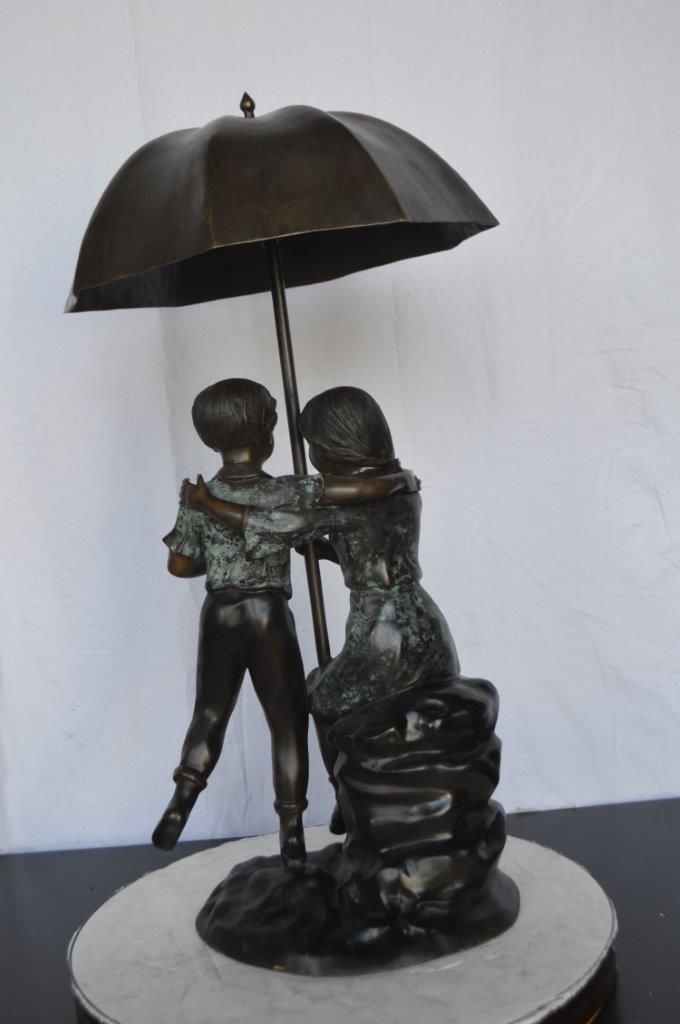 Kids Playing under Umbrella Bronze Fountain -  Size: 20"L x 20"W x 37"H.