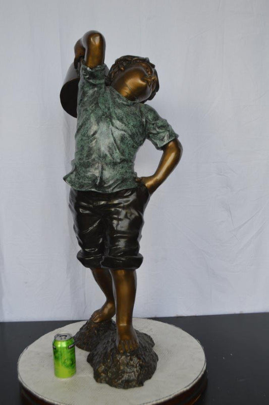 Young Boy Holding a Watering Can Bronze Fountain - Size: 25"L x 17"W x 41"H.