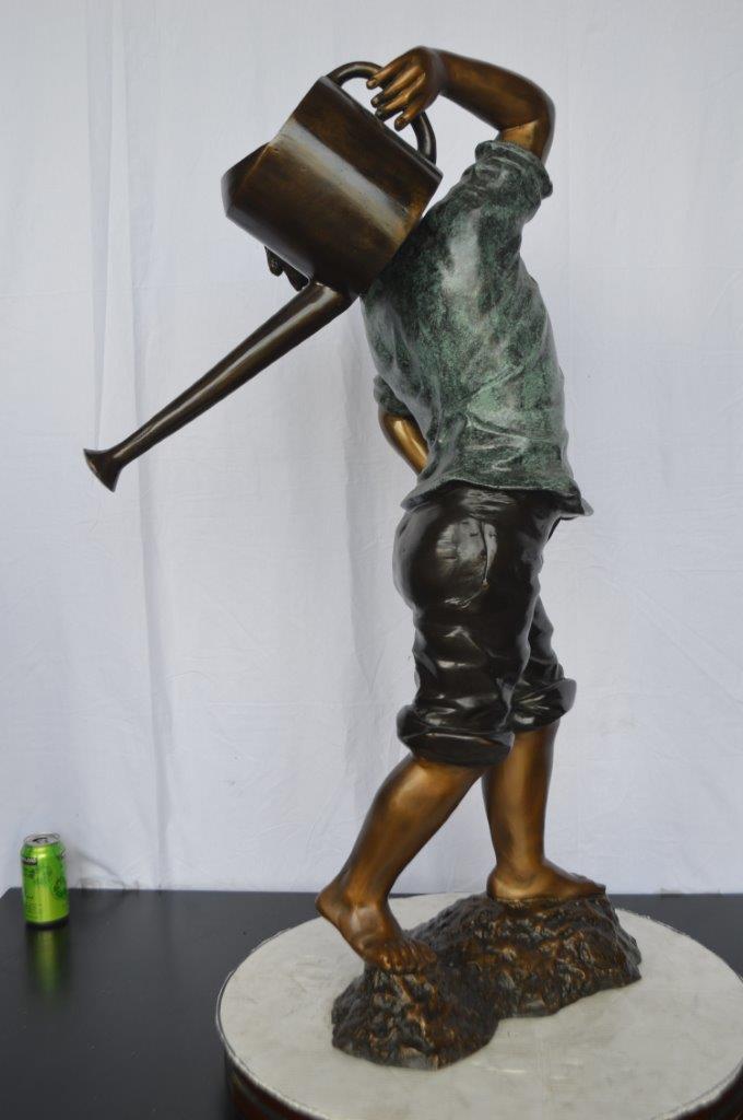 Young Boy Holding a Watering Can Bronze Fountain -  Size: 25"L x 17"W x 41"H.