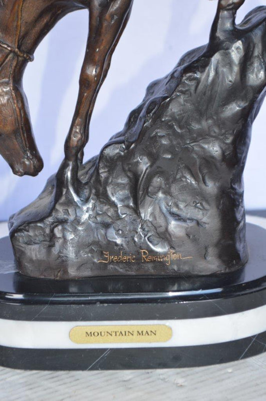 Mountain Man replica by Frederic Remington - Size: 6"L x 14"W x 22"H.