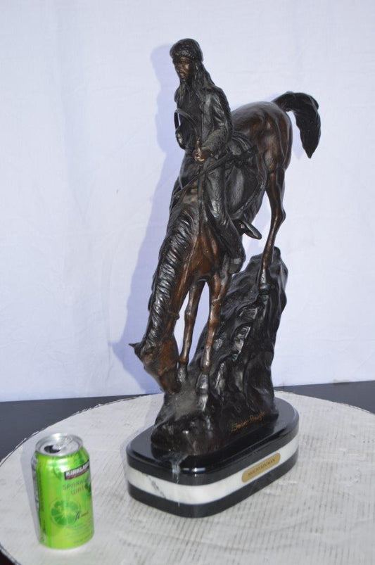 Mountain Man replica by Frederic Remington -  Size: 6"L x 14"W x 22"H.