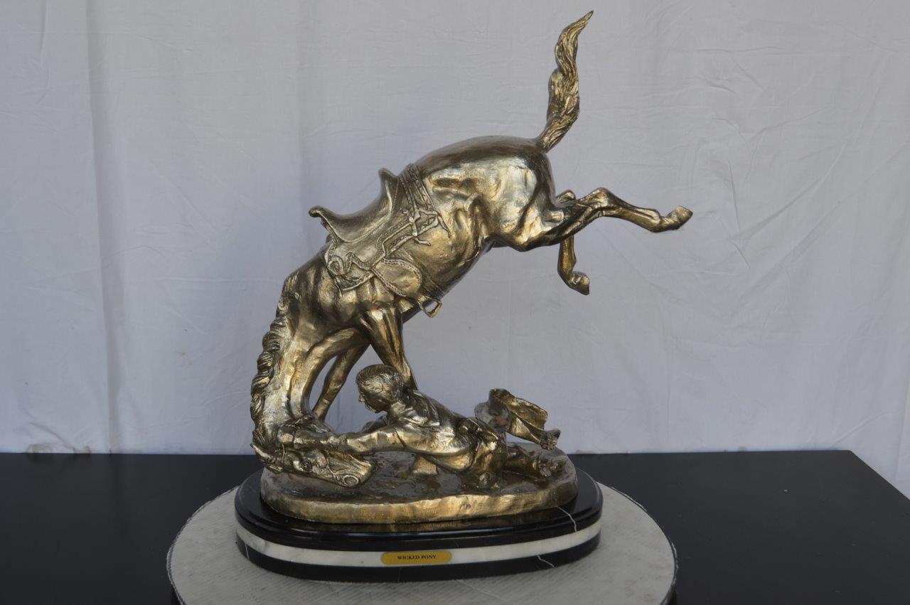 Remington Wicked Pony silver finish Bronze Statue - Size: 11"L x 22"W x 26"H.