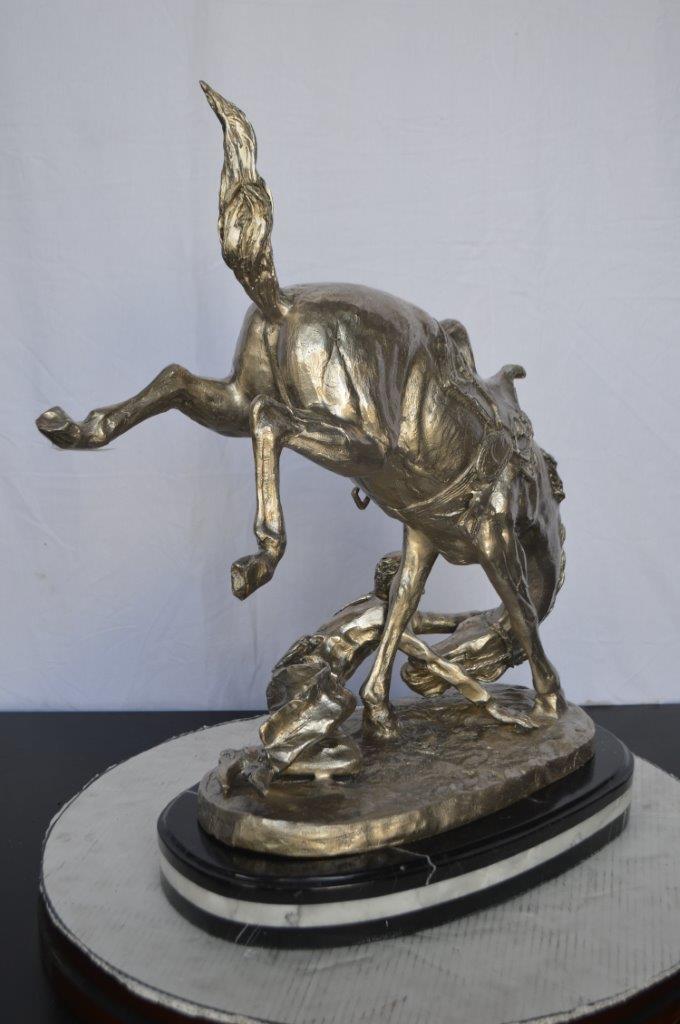 Remington Wicked Pony silver finish Bronze Statue - Size: 11"L x 22"W x 26"H.
