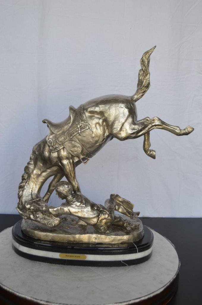 Remington Wicked Pony silver finish Bronze Statue - Size: 11"L x 22"W x 26"H.