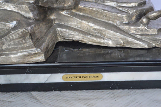 Man with two horses silver finish Bronze Statue -  Size: 25"L x 13"W x 26"H.