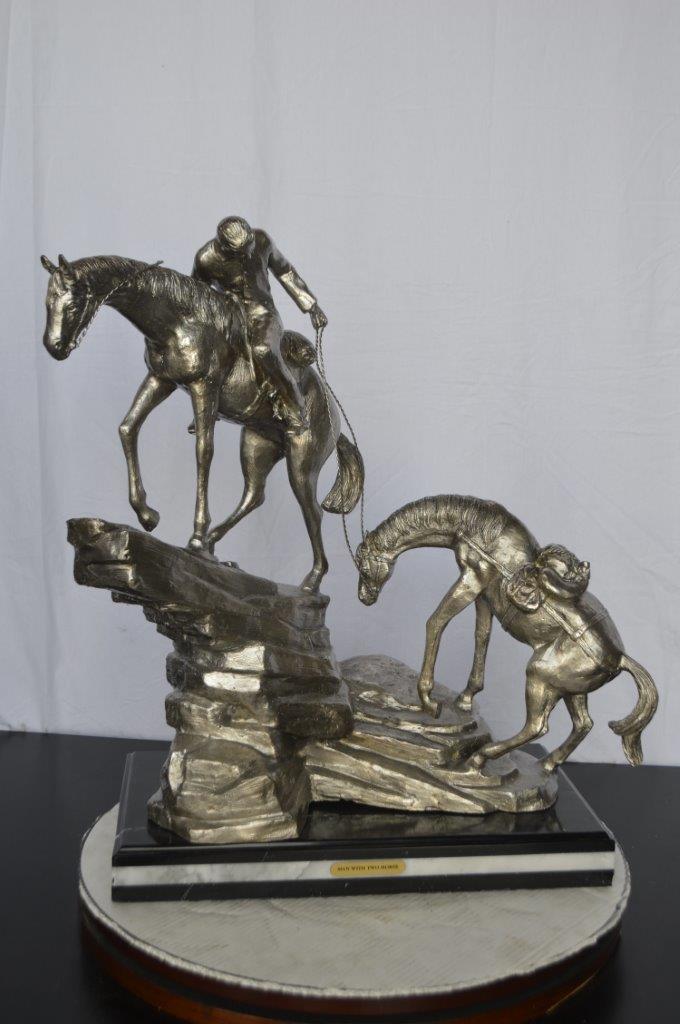 Man with two horses silver finish Bronze Statue - Size: 25"L x 13"W x 26"H.