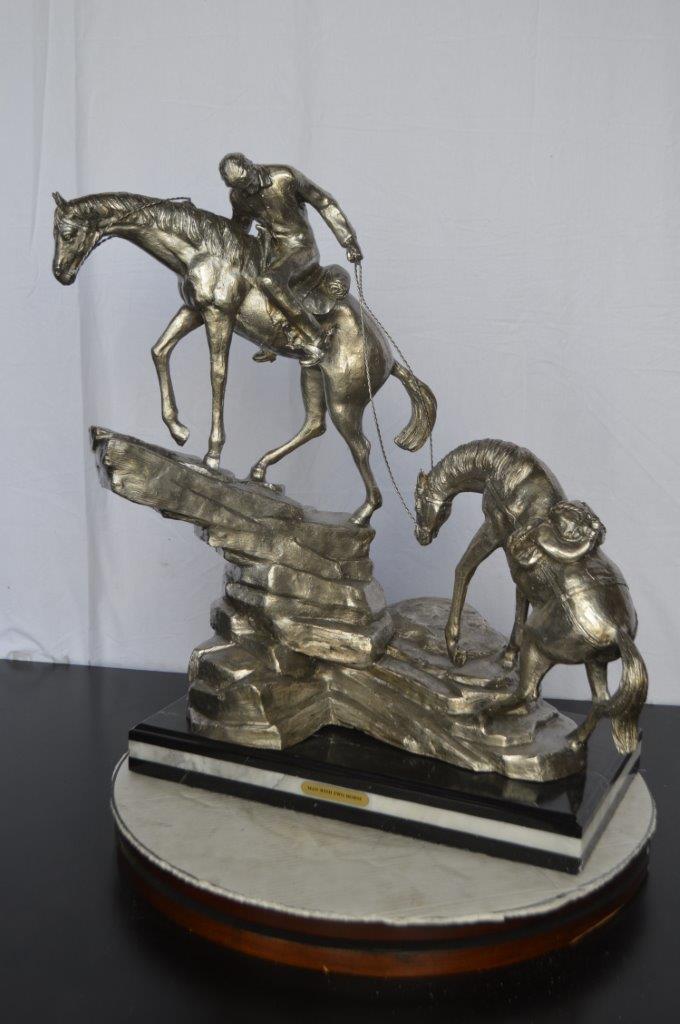 Man with two horses silver finish Bronze Statue - Size: 25"L x 13"W x 26"H.