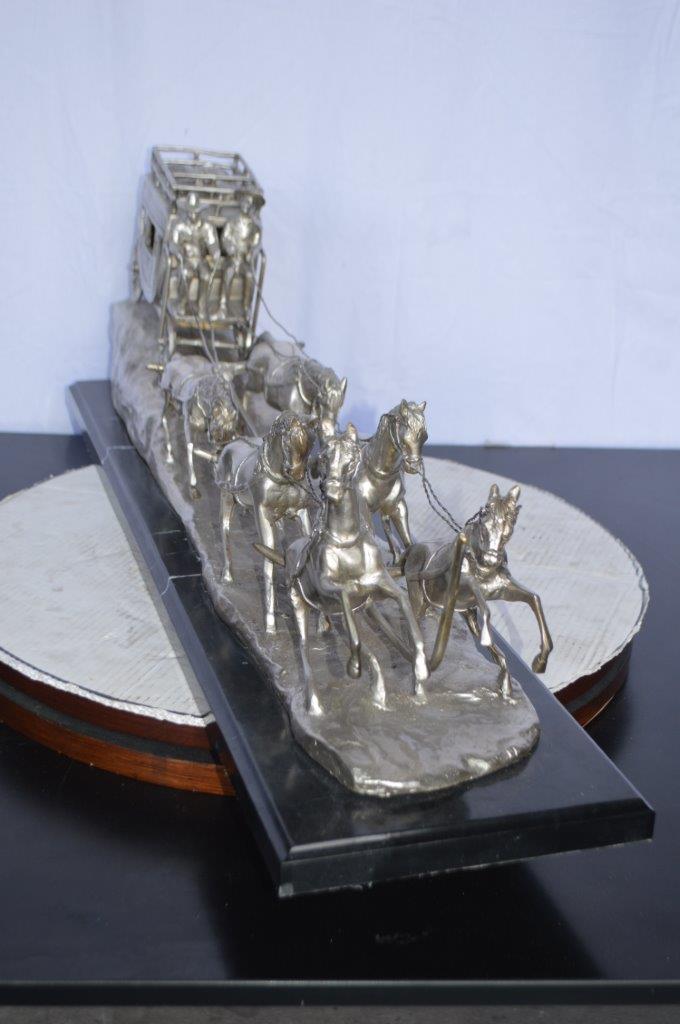 M Russell, Silver Stagecoach Replica Bronze Statue - Size: 38"L x 10"W x 12"H.