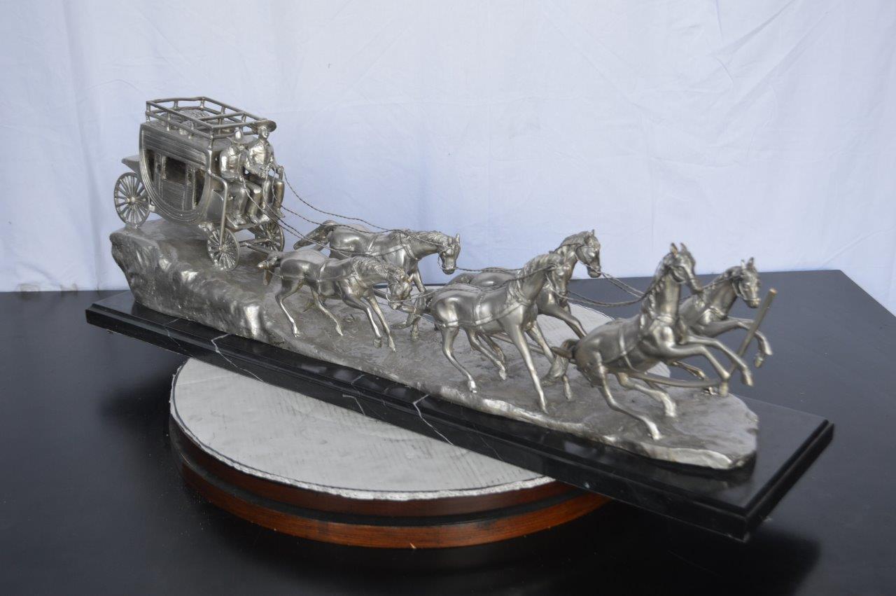 M Russell, Silver Stagecoach Replica Bronze Statue - Size: 38"L x 10"W x 12"H.
