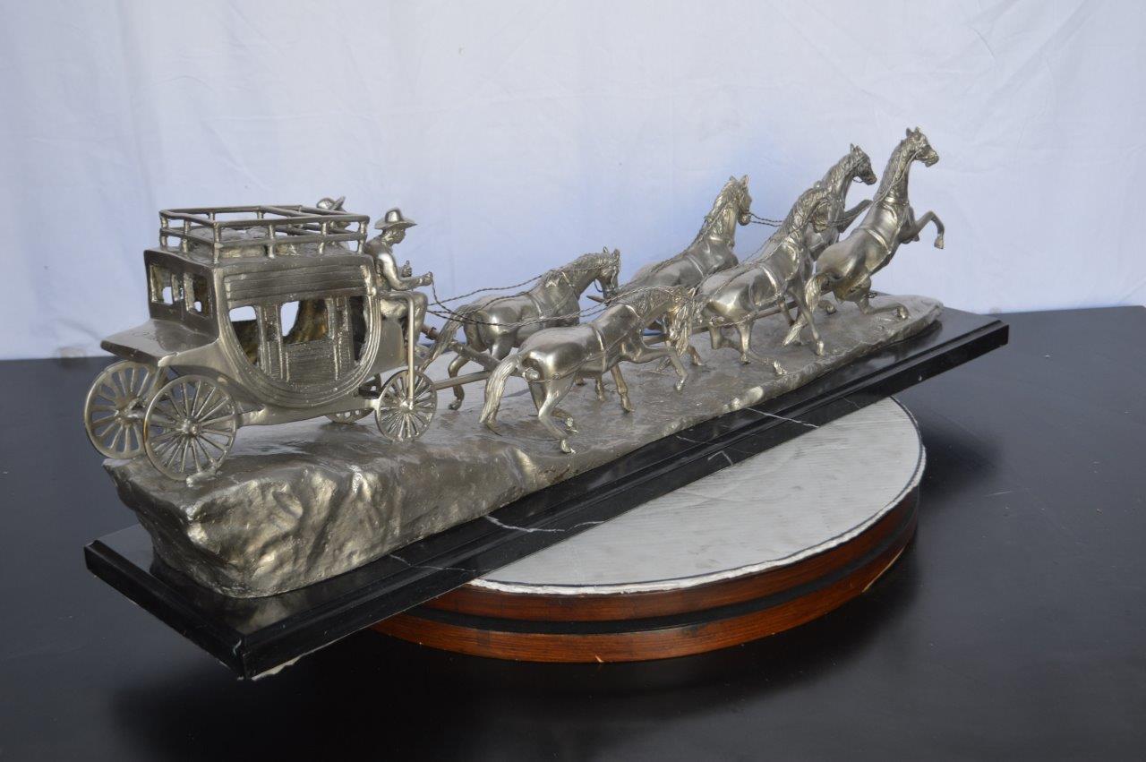 M Russell, Silver Stagecoach Replica Bronze Statue - Size: 38"L x 10"W x 12"H.