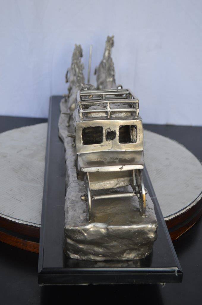 M Russell, Silver Stagecoach Replica Bronze Statue - Size: 38"L x 10"W x 12"H.