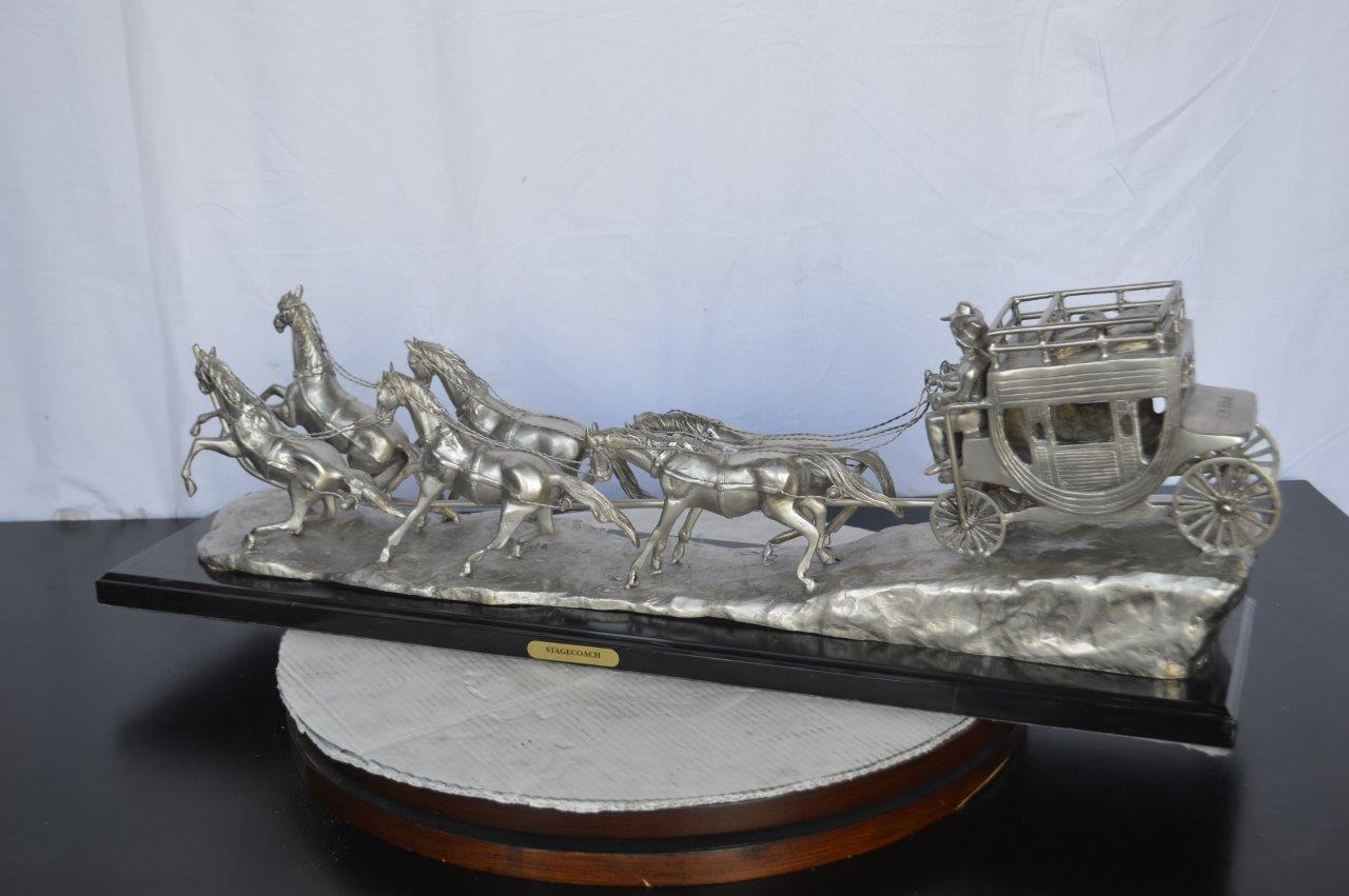 M Russell, Silver Stagecoach Replica Bronze Statue - Size: 38"L x 10"W x 12"H.