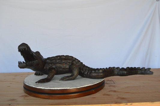 Alligator ready to attack bronze statue - Size: 36"L x 18"W x 10"H.