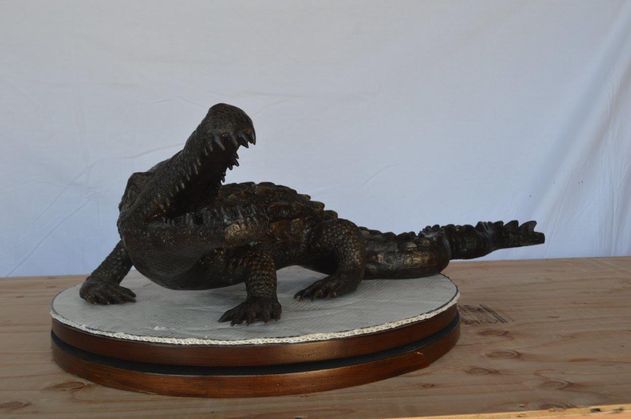 Alligator ready to attack bronze statue -  Size: 36"L x 18"W x 10"H.