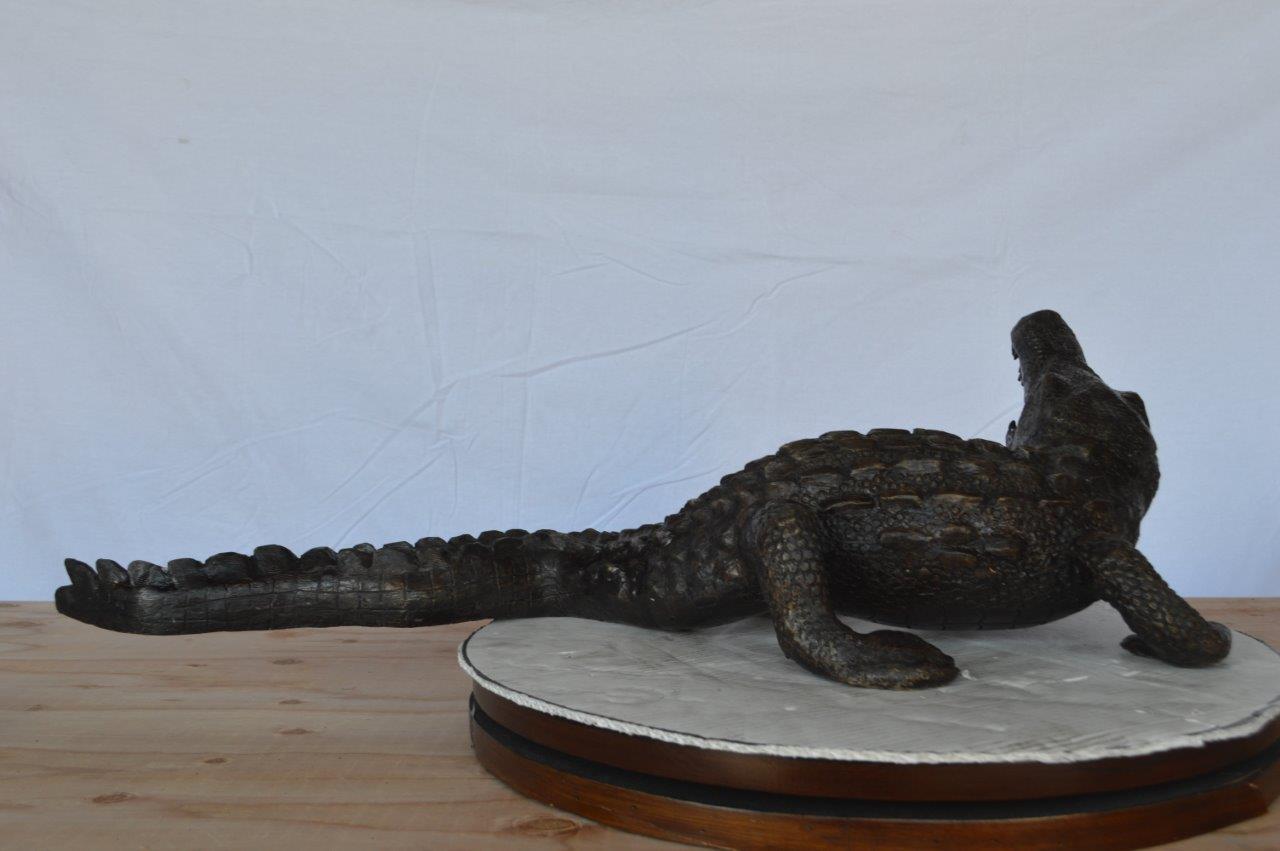 Alligator ready to attack bronze statue -  Size: 36"L x 18"W x 10"H.