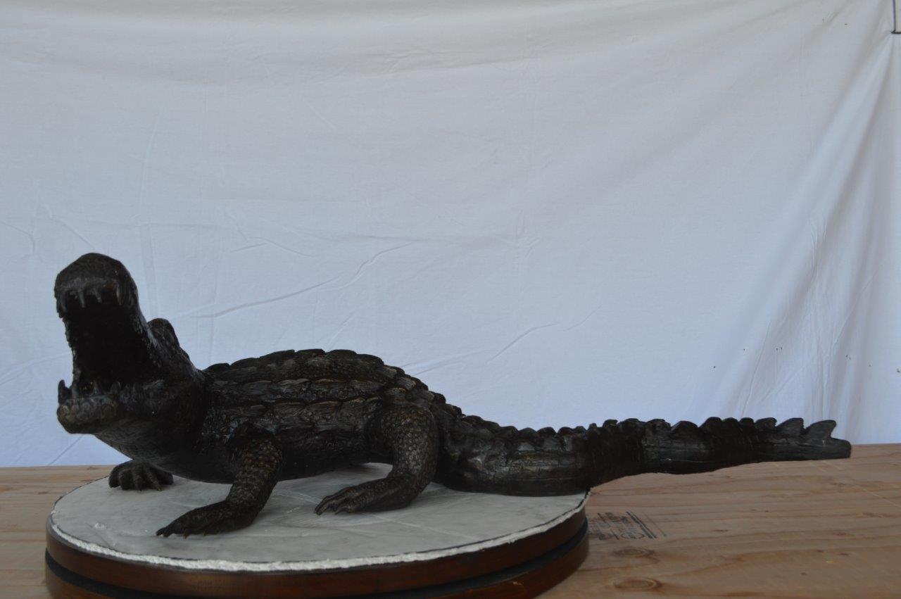 Alligator ready to attack bronze statue - Size: 36"L x 18"W x 10"H.