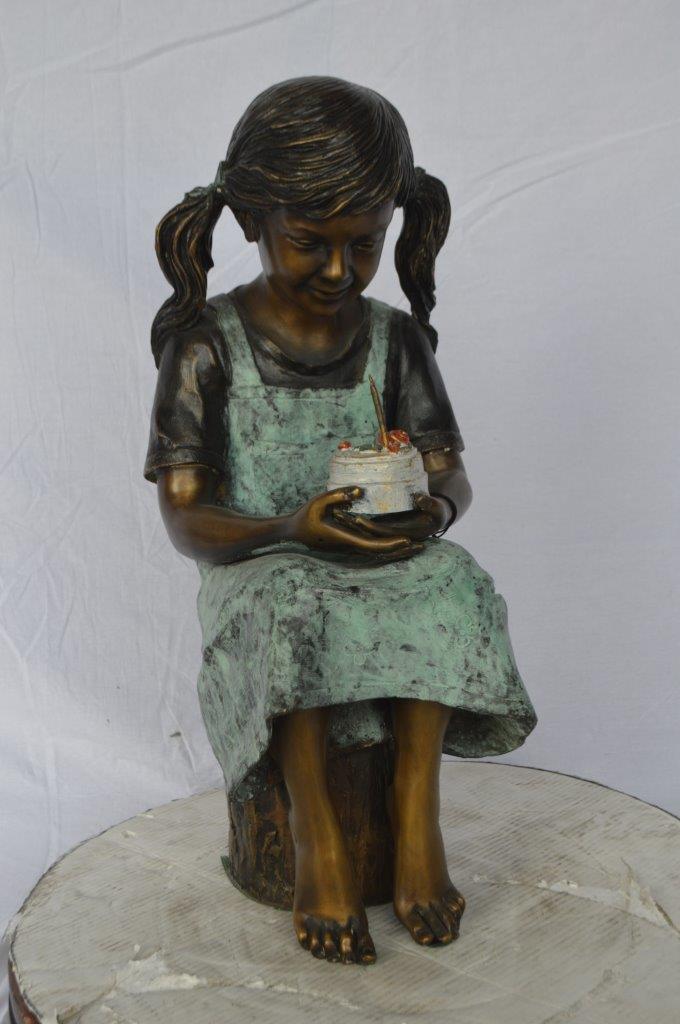 Girl with birthday cake bronze statue - Size: 13"L x 10"W x 27"H.