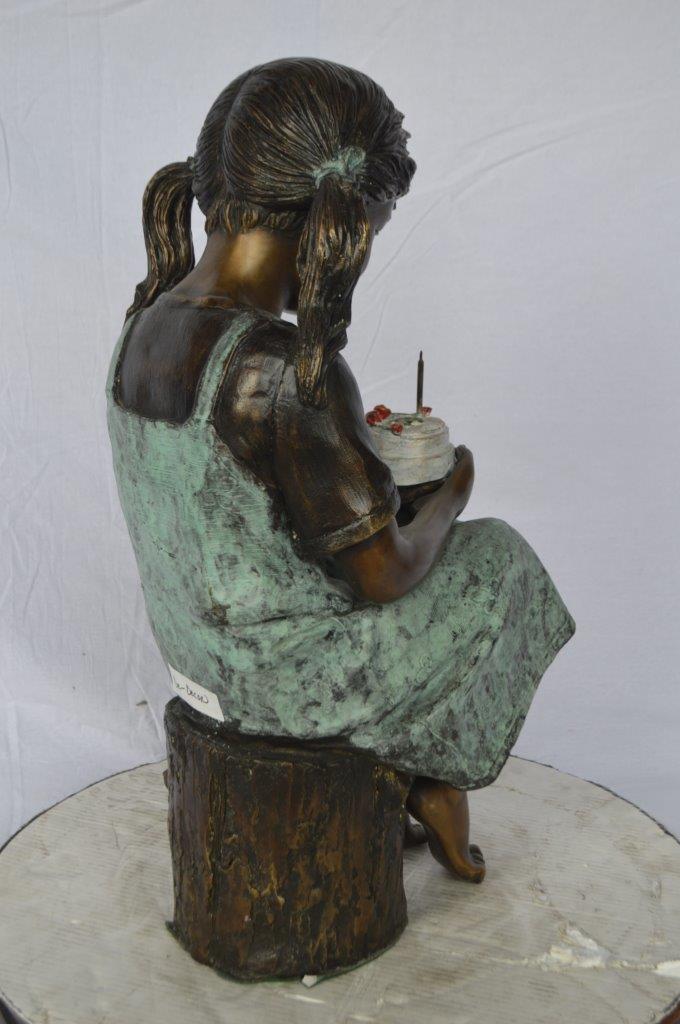 Girl with birthday cake bronze statue - Size: 13"L x 10"W x 27"H.