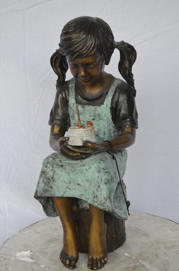 Girl with birthday cake bronze statue - Size: 13"L x 10"W x 27"H.