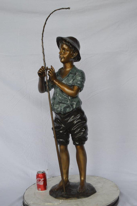Boy with fishing rod  bronze statue -  Size: 11"L x 14"W x 44"H.