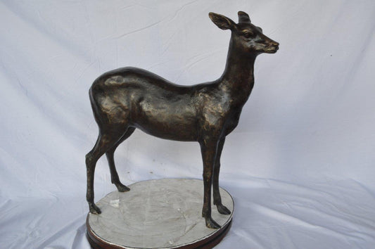 Doe - baby deer bronze statue - Size: 30"L x 8"W x 30"H.