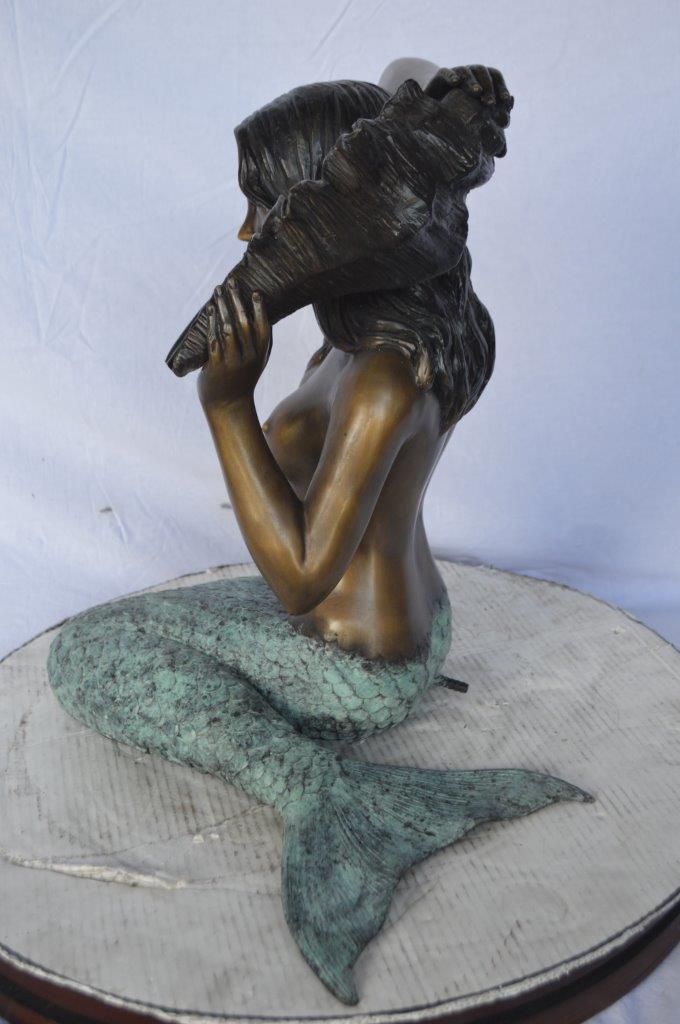 Mermaid with Conch  shell bronze statue -  Size: 16"L x 17"W x 21"H.