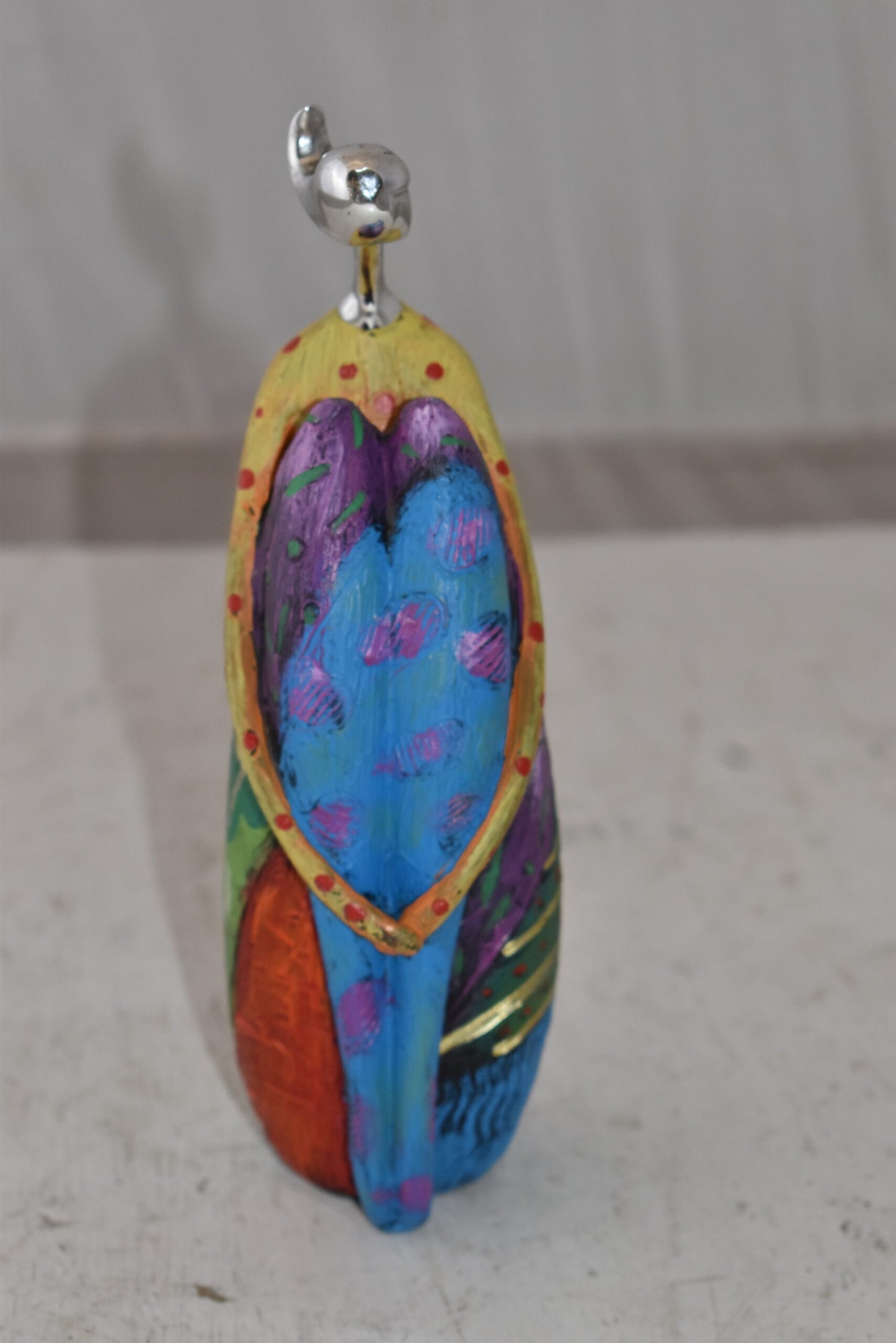 Cradled Woman with Silver Head Resin Statue Size: 3" x 3" x 10"H