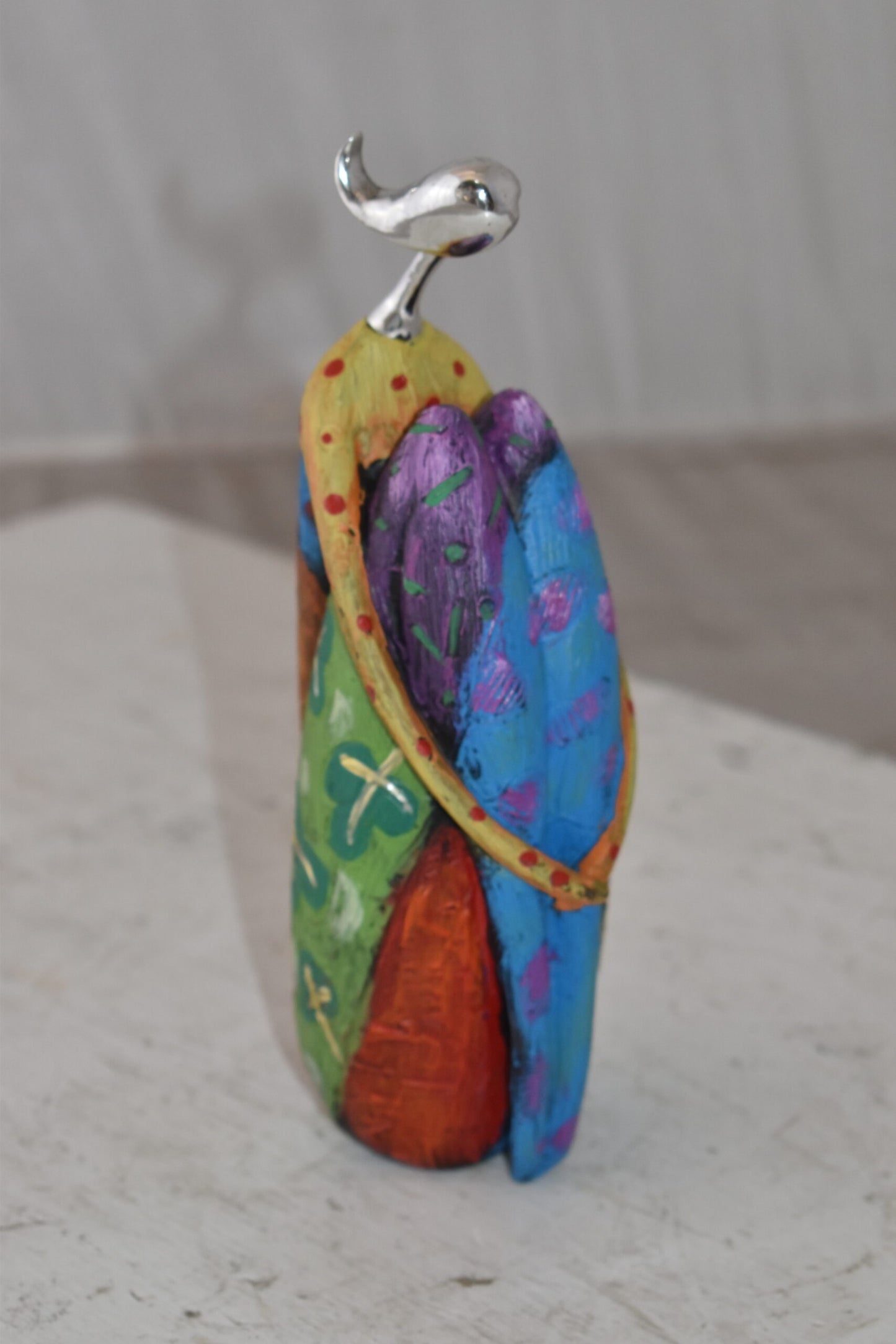 Cradled Woman with Silver Head Resin Statue Size: 3" x 3" x 10"H