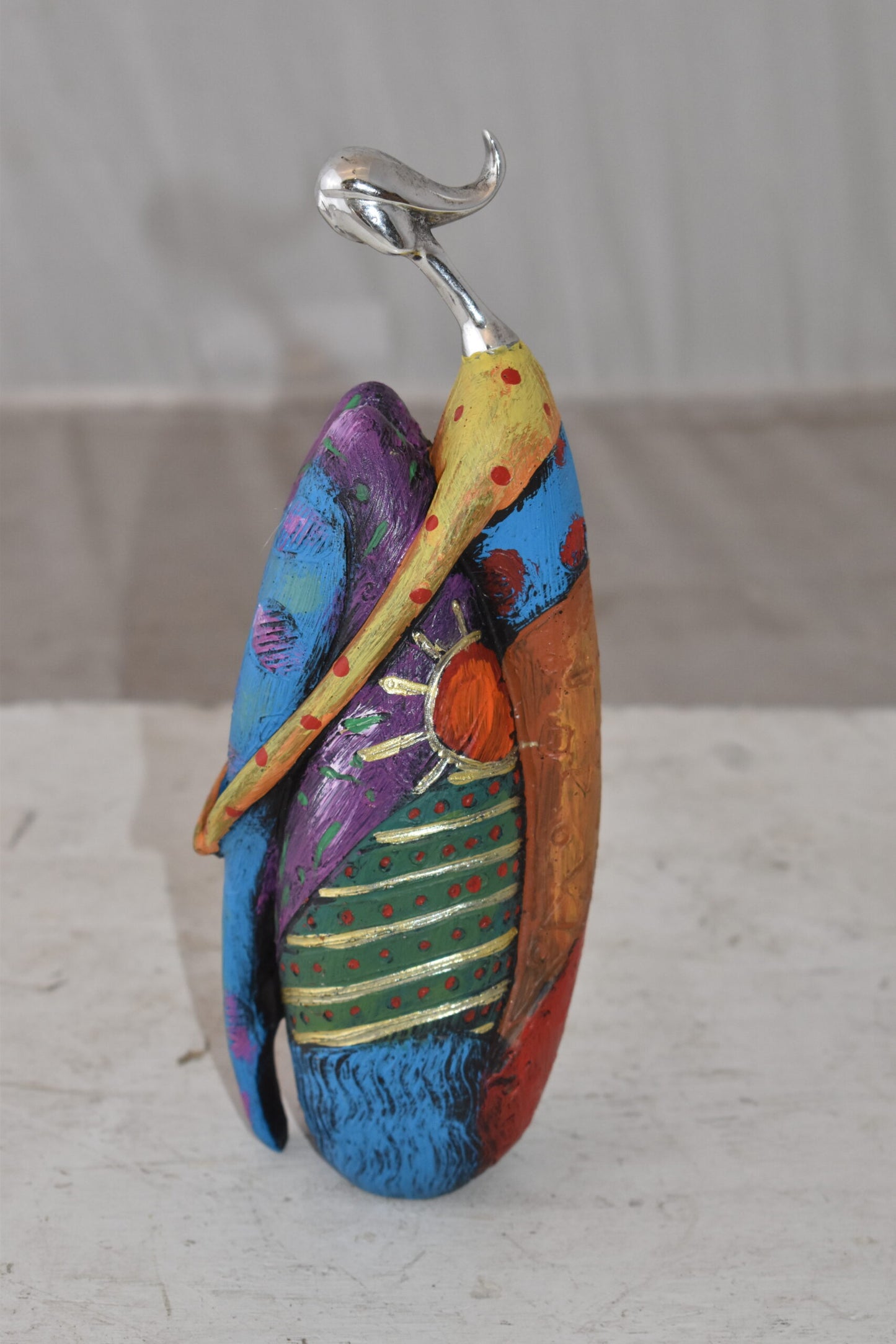 Cradled Woman with Silver Head Resin Statue Size: 3" x 3" x 10"H