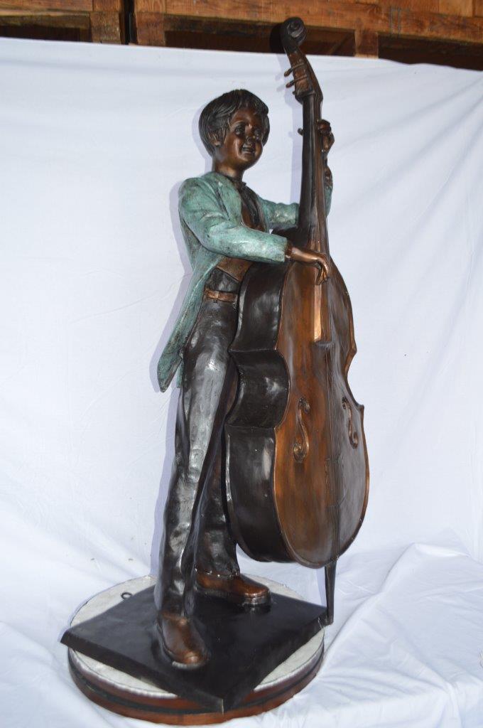Boy playing cello large bronze statue - Size: 19"L x 22"W x 59"H.
