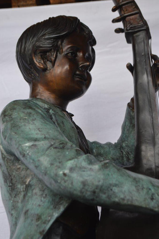 Boy playing cello large bronze statue - Size: 19"L x 22"W x 59"H.