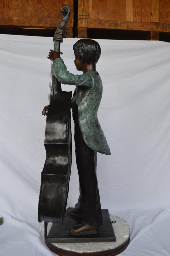 Boy playing cello large bronze statue - Size: 19"L x 22"W x 59"H.