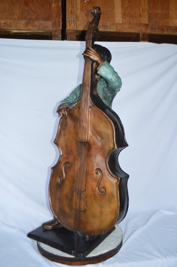 Boy playing cello large bronze statue - Size: 19"L x 22"W x 59"H.