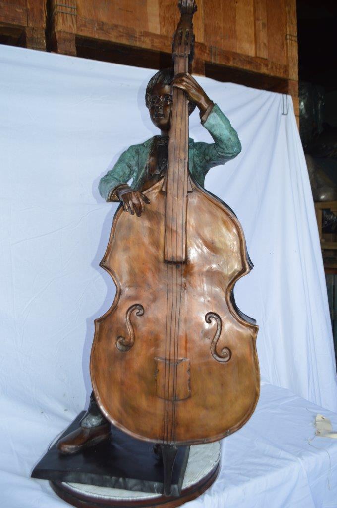 Boy playing cello large bronze statue - Size: 19"L x 22"W x 59"H.