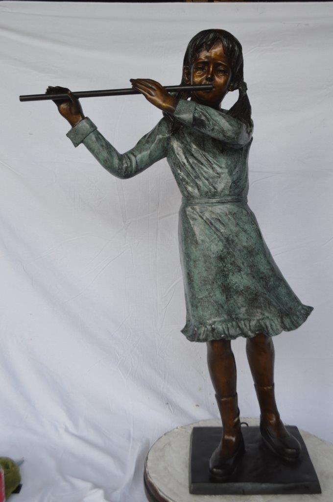 Girl playing flute large bronze statue - Size: 30"L x 15"W x 50"H.
